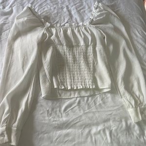White ruffle shirt